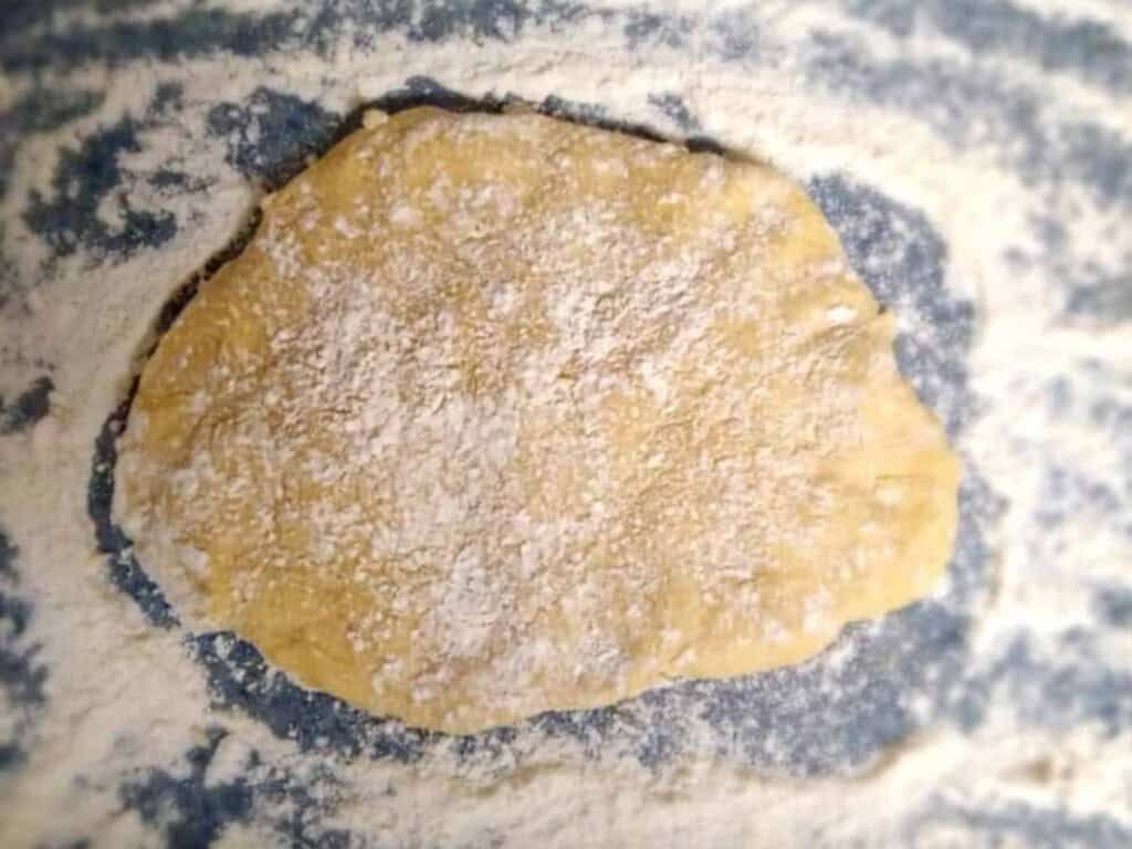 getting ready to roll out the noodle dough.