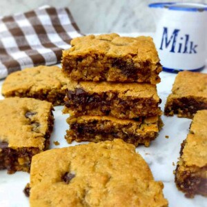 a stack of chewy oatmeal chocolate chip bars