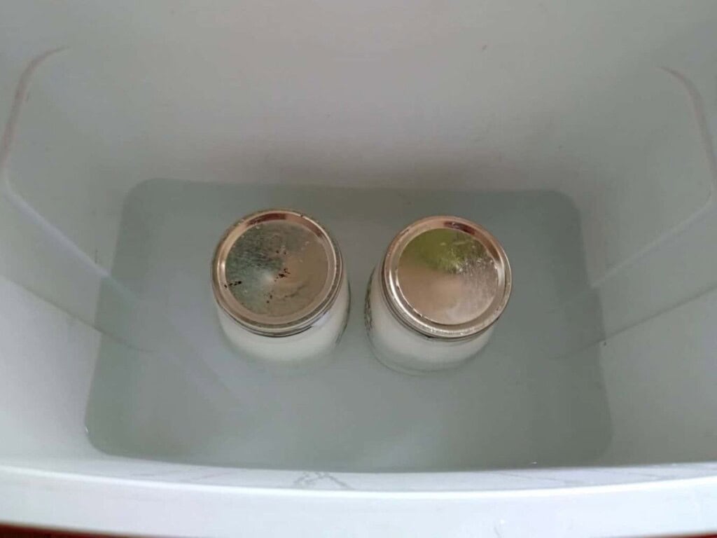 making vanilla yogurt in warm water in a cooler ice chest