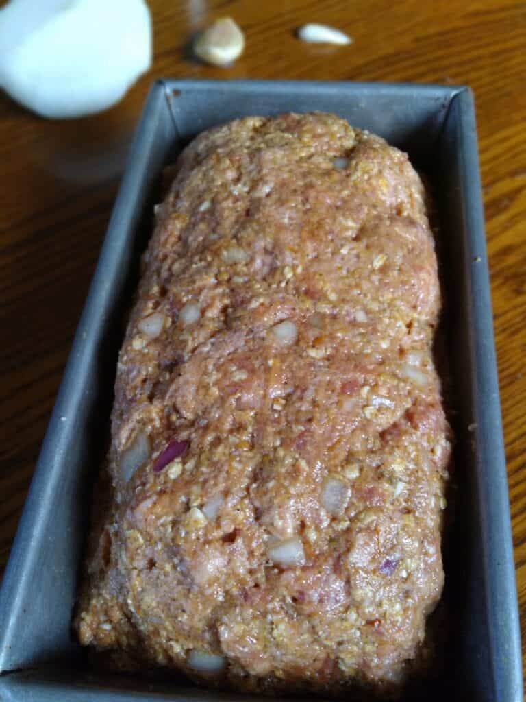 meatloaf formed in a loaf pan.