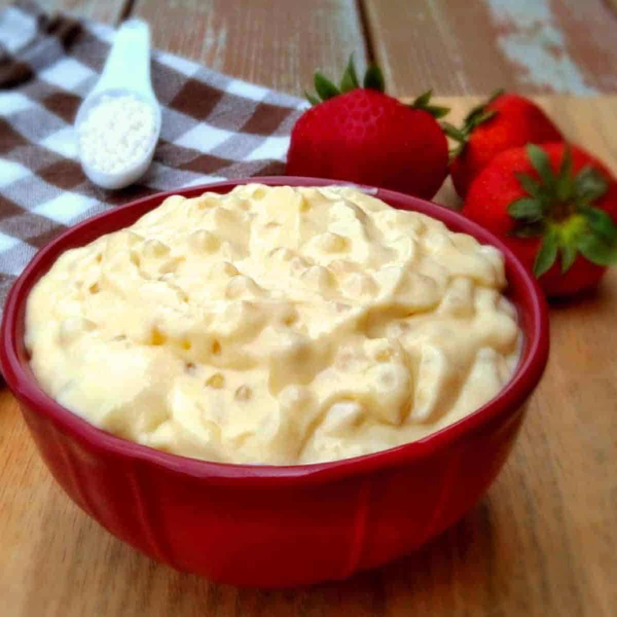 small red bowl full of Amish tapioca pudding.