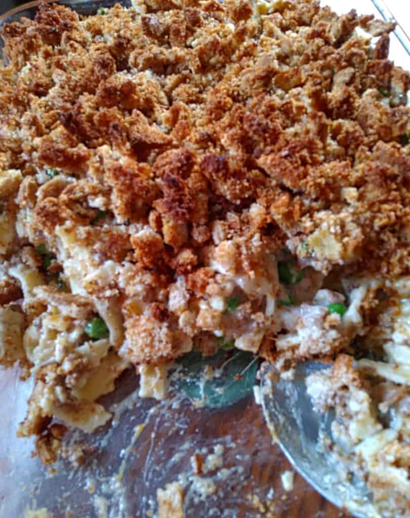 Amish noodle casserole topped with bread crumbles.
