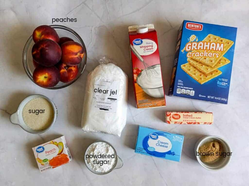 Ingredients: peaches, clear jel, jello, sugar, cream cheese, whipping cream, powdered sugar, butter, graham crackers, and brown sugar.