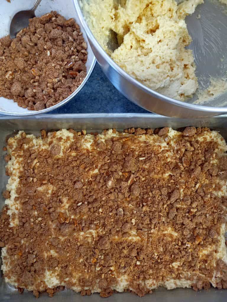 layer the cake batter with the cinnamon streusel.