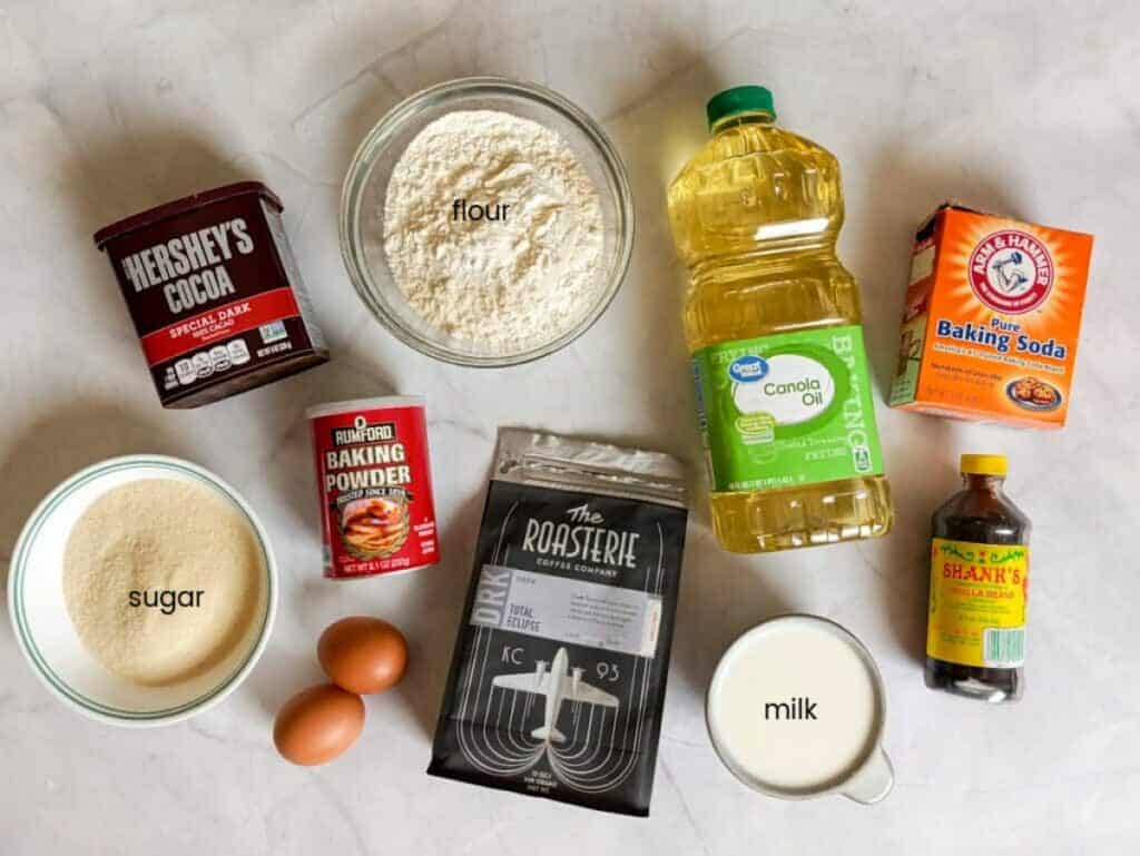 Ingredients: flour, sugar, eggs, milk, coffee, cocoa powder, baking soda, baking powder, oil, and vanilla.