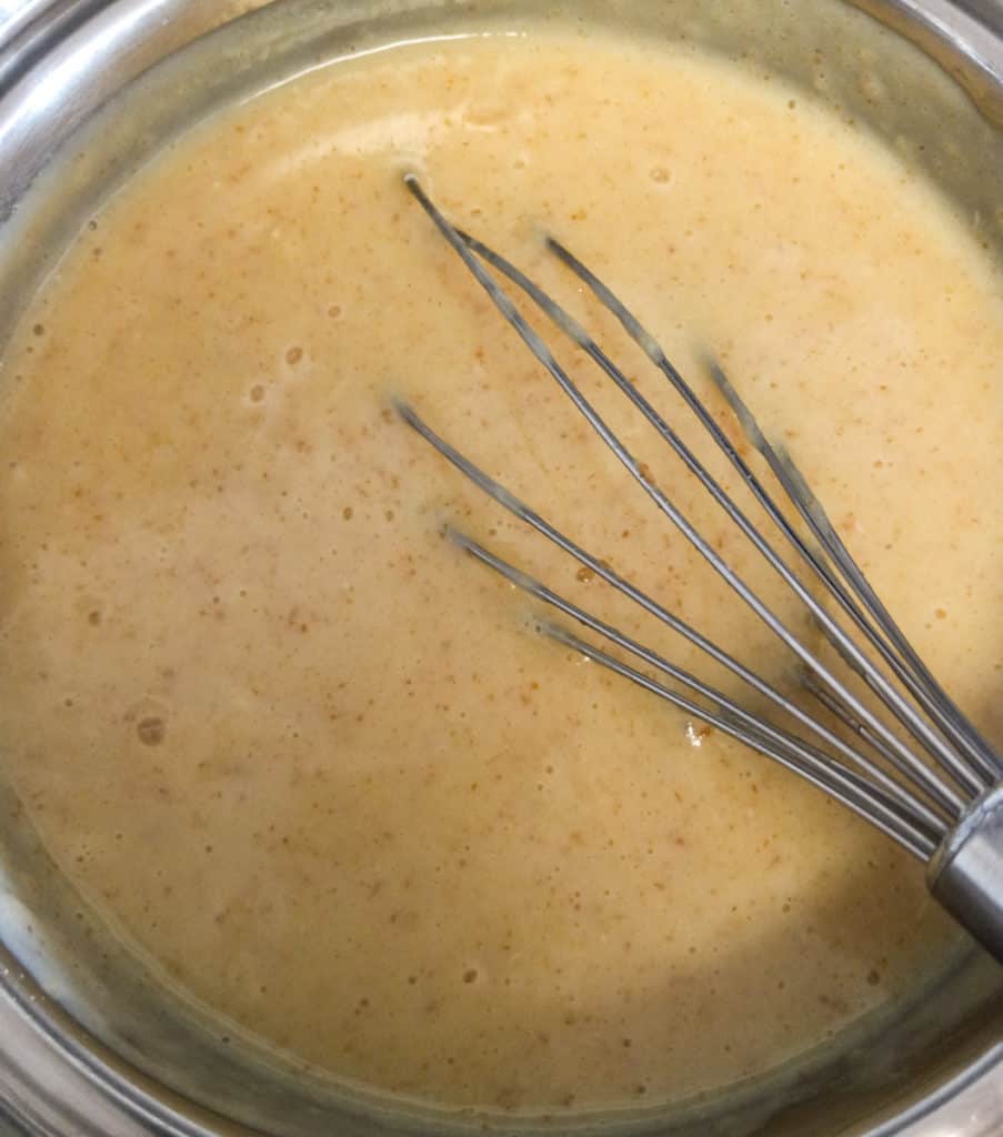 cracker-pudding-in-pot-with-whisk
