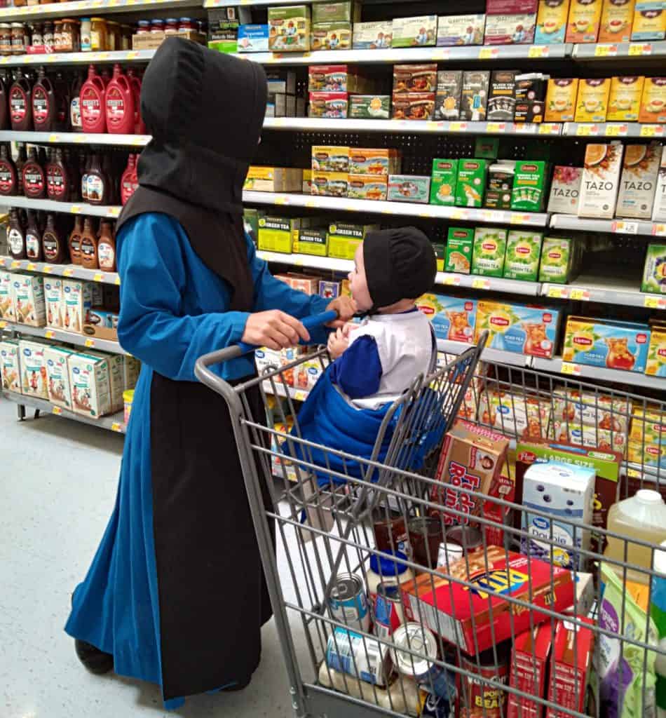 Amish lady and baby shopping at Walmart