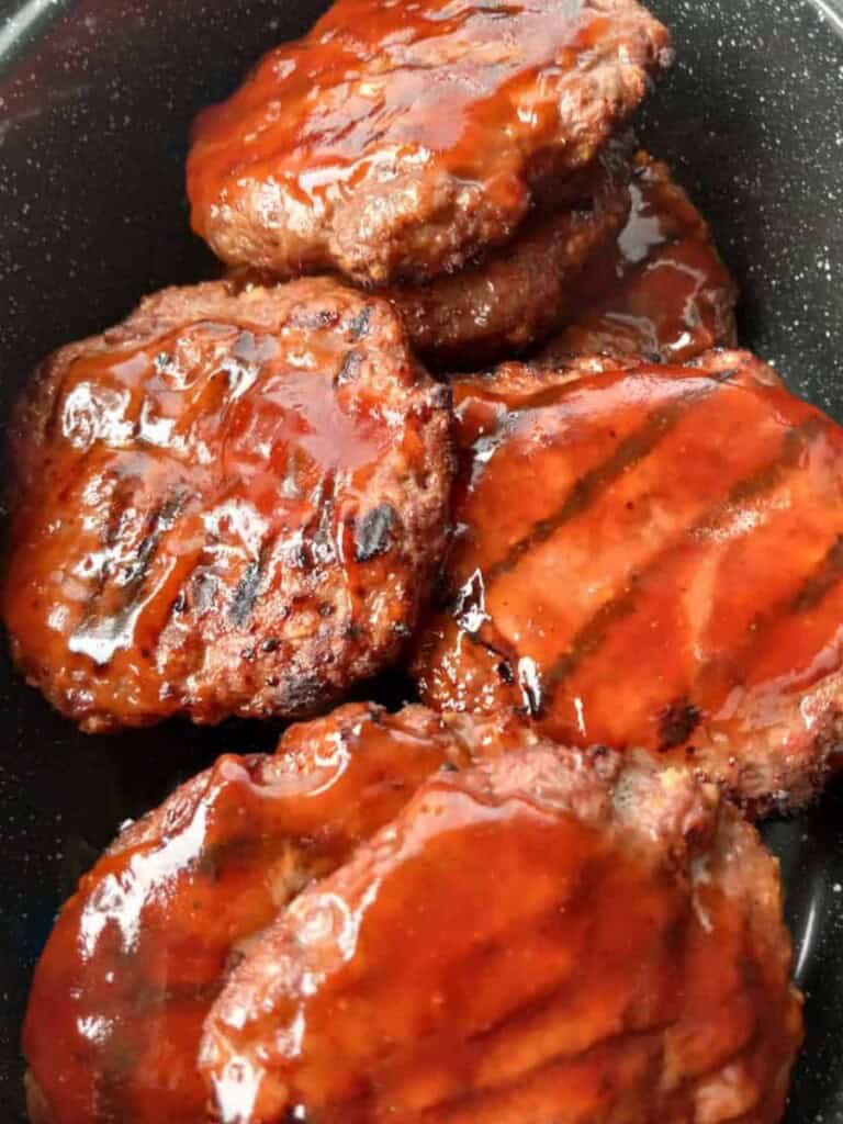 pan full of bbq burgers