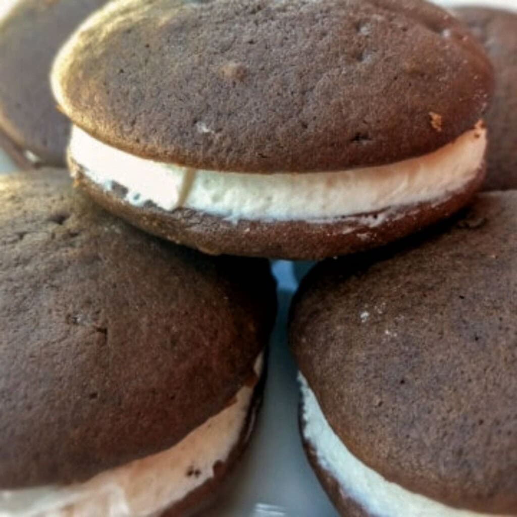 a stack of Amish chocolate whoopie pies with a light vanilla filling.