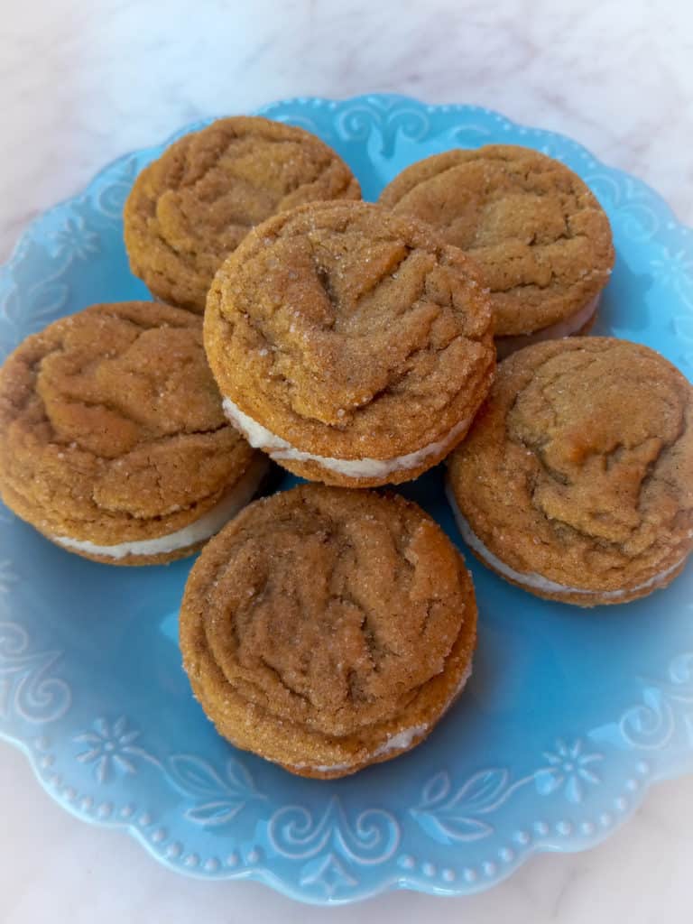 molasses crinkle cookie whoopie pies on a plate