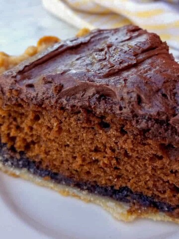 a slice of chocolate shoofly pie on a small plate.