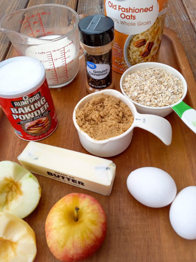 ingredients-oatmeal-brown-sugar-eggs-milk-baking-powder-cinnamon-butter-and-apples.