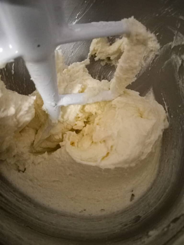 creamed butter and sugars in mixing bowl
