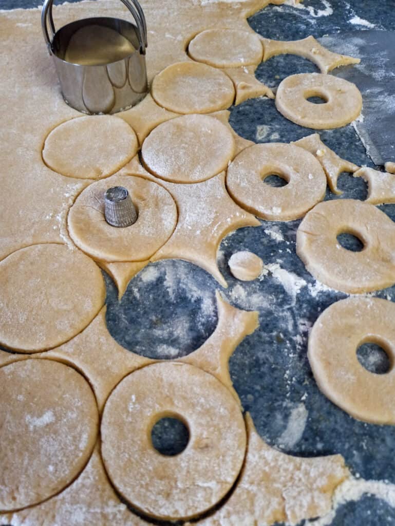 cutting dough circles for cookies