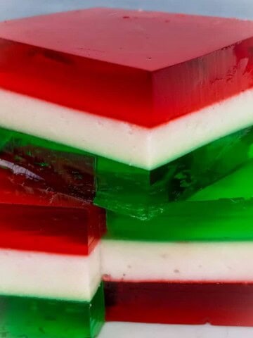 stack of layered finger jello cubes for an Amish Christmas.