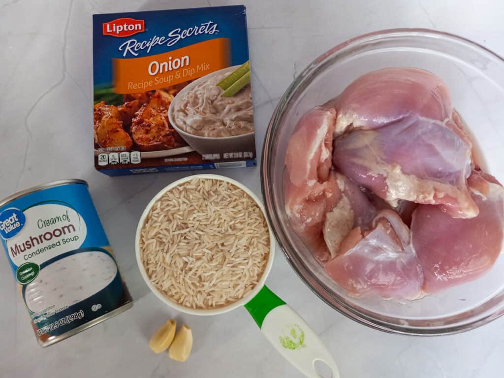 Ingredients - chicken thighs, rice, mushroom soup, garlic, and onion soup mix 