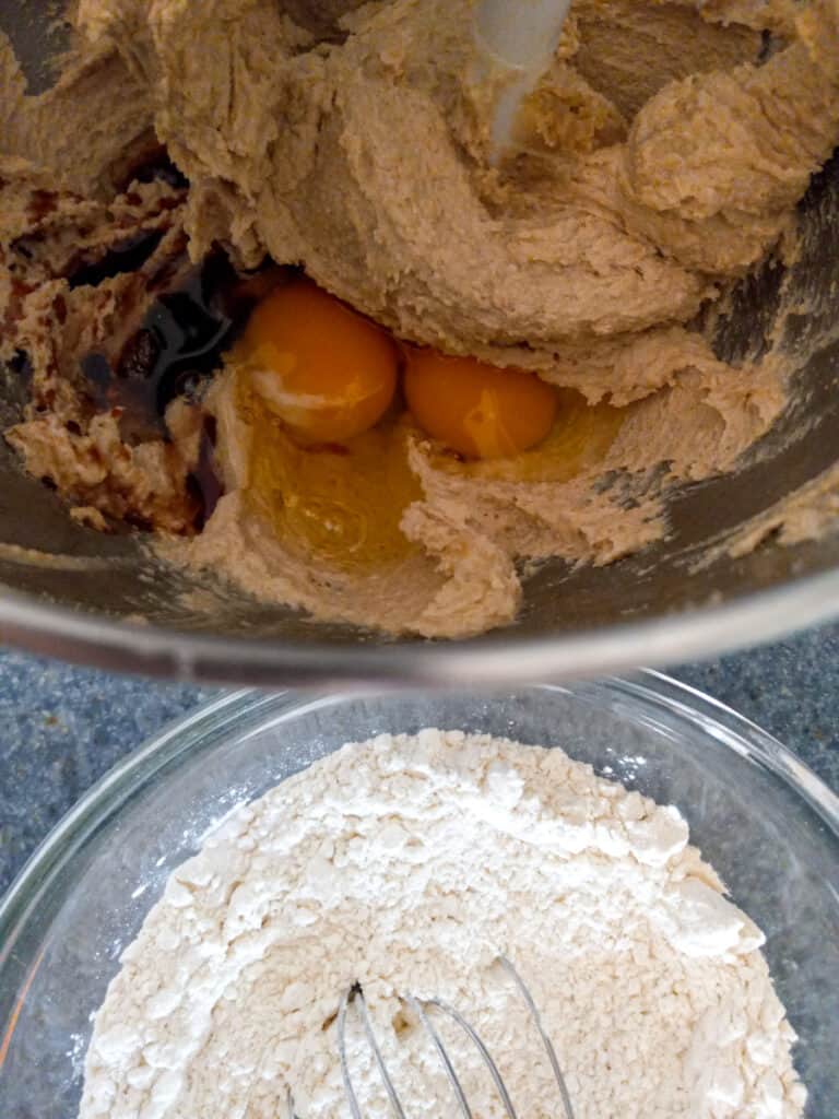 mixing batter in large mixing bowl and a bowl with dry ingredients