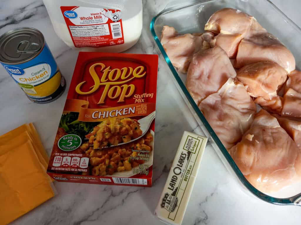 Ingredients: chicken breast, cream of chicken soup, milk, butter, cheese, and stuffing