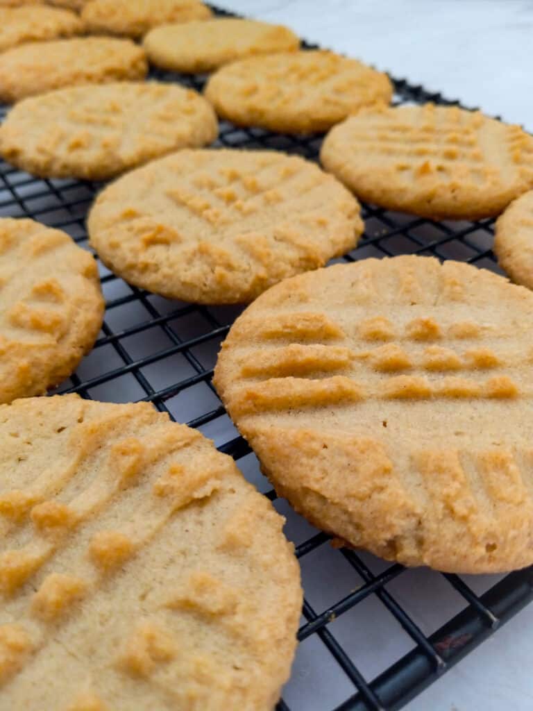 Old-fashioned peanut butter cookies on a wire rack