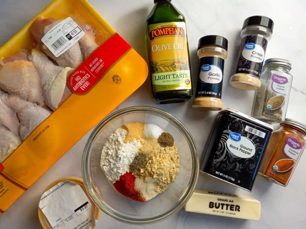 ingredients - chicken legs, oil, flour, cracker crumbs, butter, and seasonings