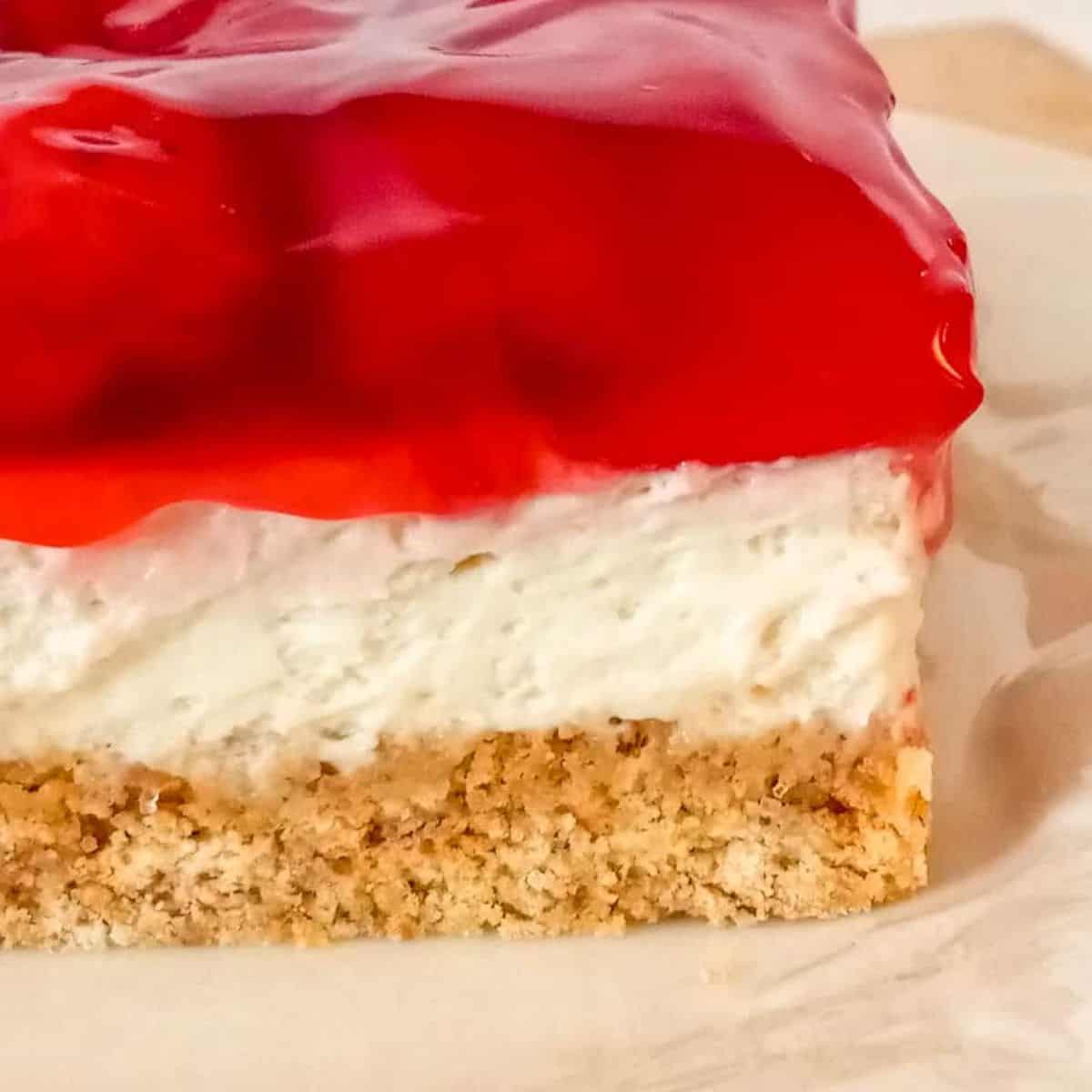 old-fashioned Amish cherry pie filling dessert with graham crust and cream cheese filling.