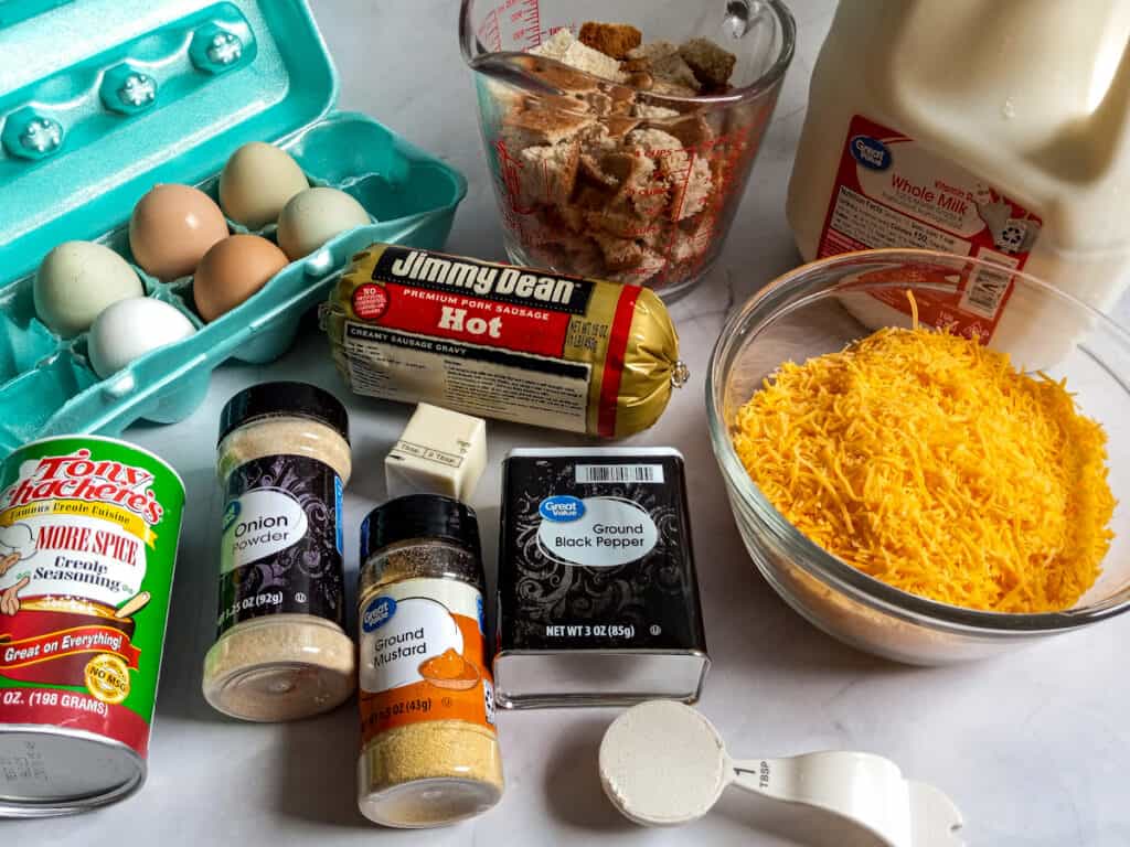 Ingredients: eggs, bread, sausage, cheese, milk, butter, flour, ground mustard, and seasonings