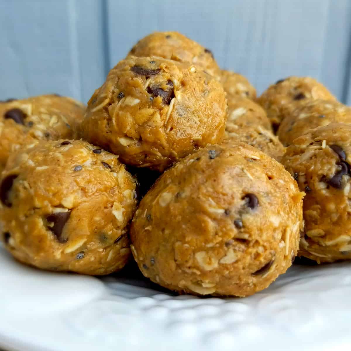 Amish homemade peanut butter protein balls stacked on a plate