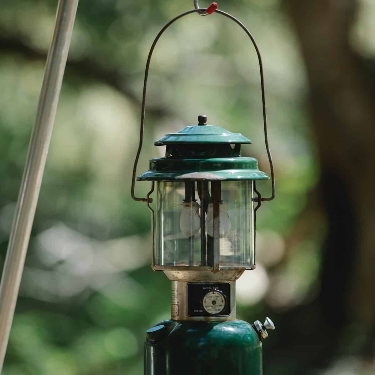kerosene lantern hanging on a pole