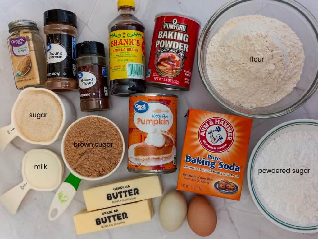 Ingredients: flour, baking powder, vanilla, spices, brown sugar, white sugar, milk, pumpkin, baking soda, powdered sugar, butter, and eggs