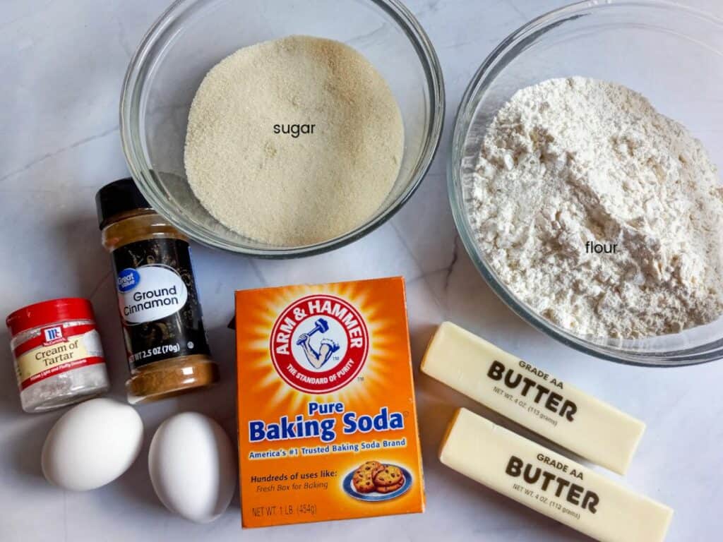 Ingredients: flour, sugar, butter, cinnamon, baking soda, cream of tartar, and eggs.
