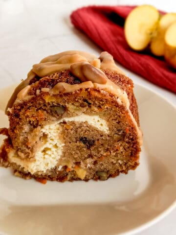 slice of Amish apple cream cheese cake on a plate