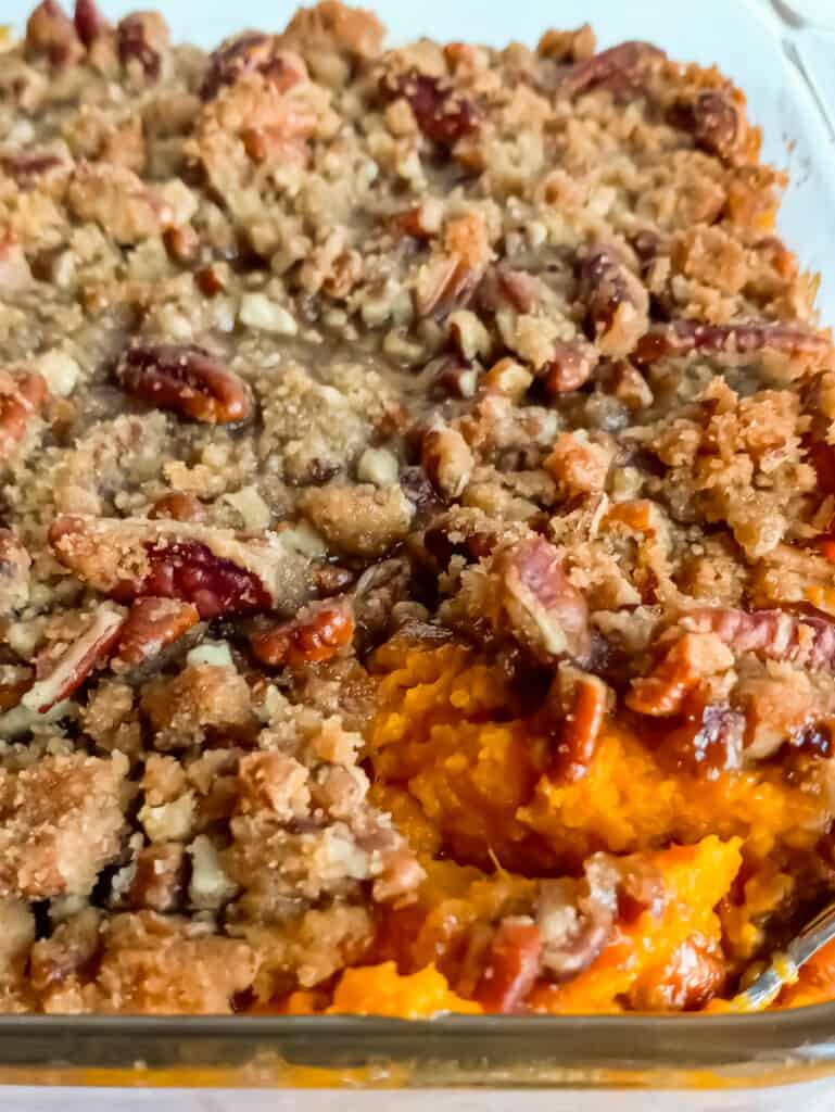 buttery, crispy pecan streusel on top of mashed sweet potatoes.