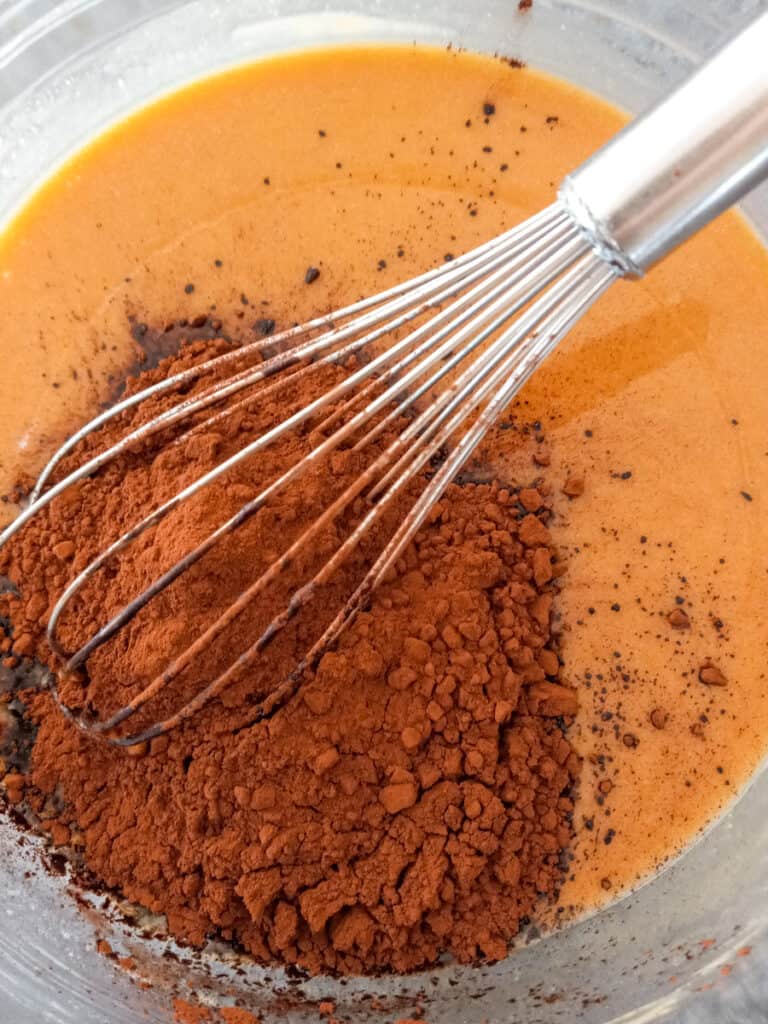 adding cocoa powder to the butter/peanut butter mixture.