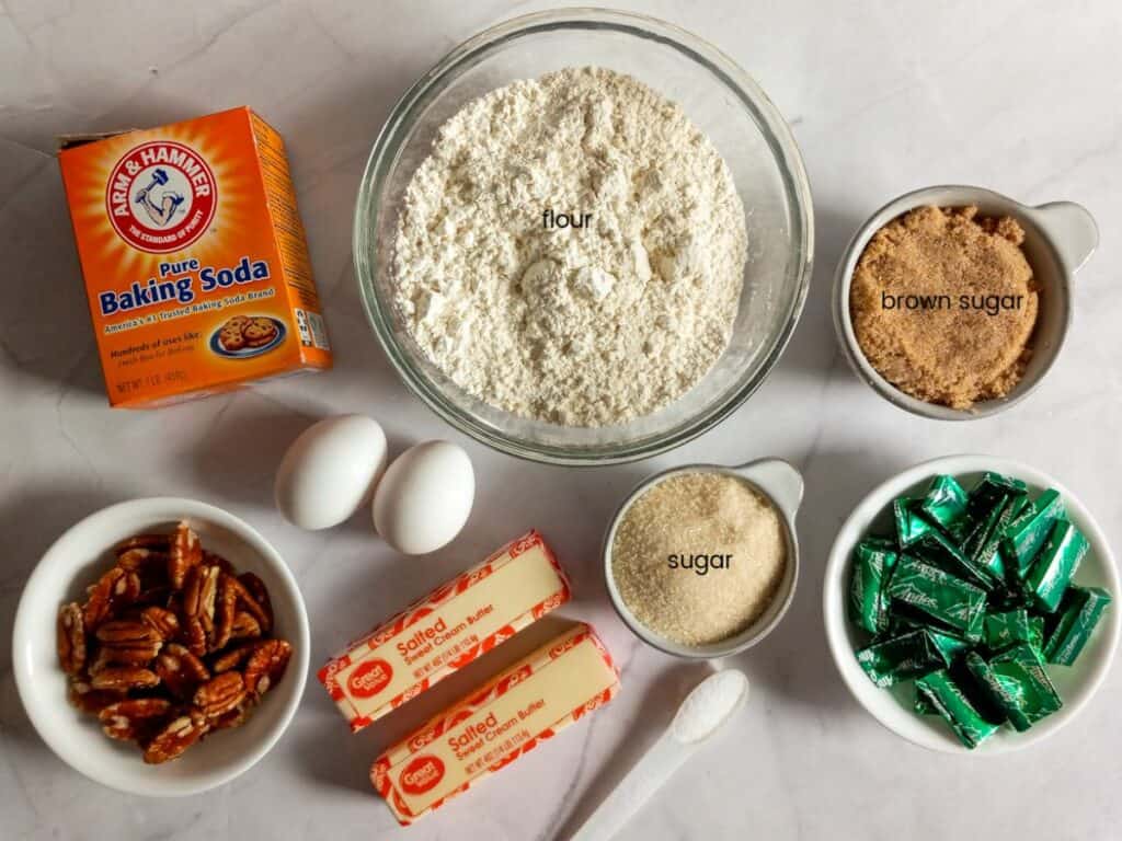 Ingredients: flour, sugar, brown sugar, butter, eggs, salt, baking soda, pecans, and Andes mints