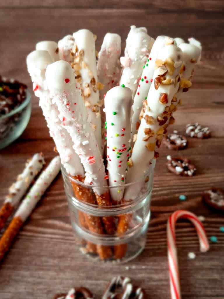 coated pretzel rods with crushed peppermints and chopped nuts.