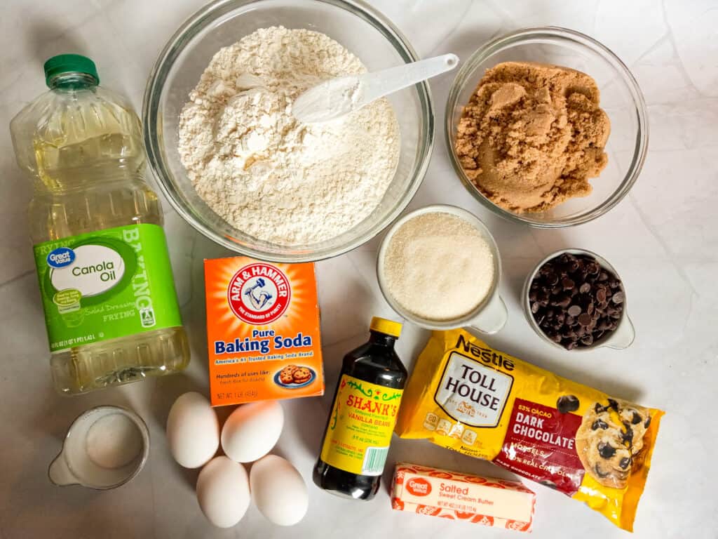 Ingredients: flour, sugar, cornstarch, baking soda, salt, vanilla, eggs, sugar, brown sugar, oil, butter, and chocolate chips.