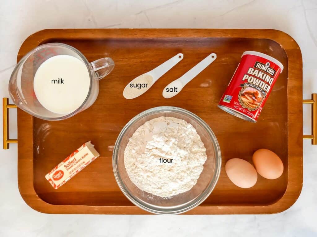 Ingredients: flour, sugar, butter, milk, eggs, baking powder, and salt.
