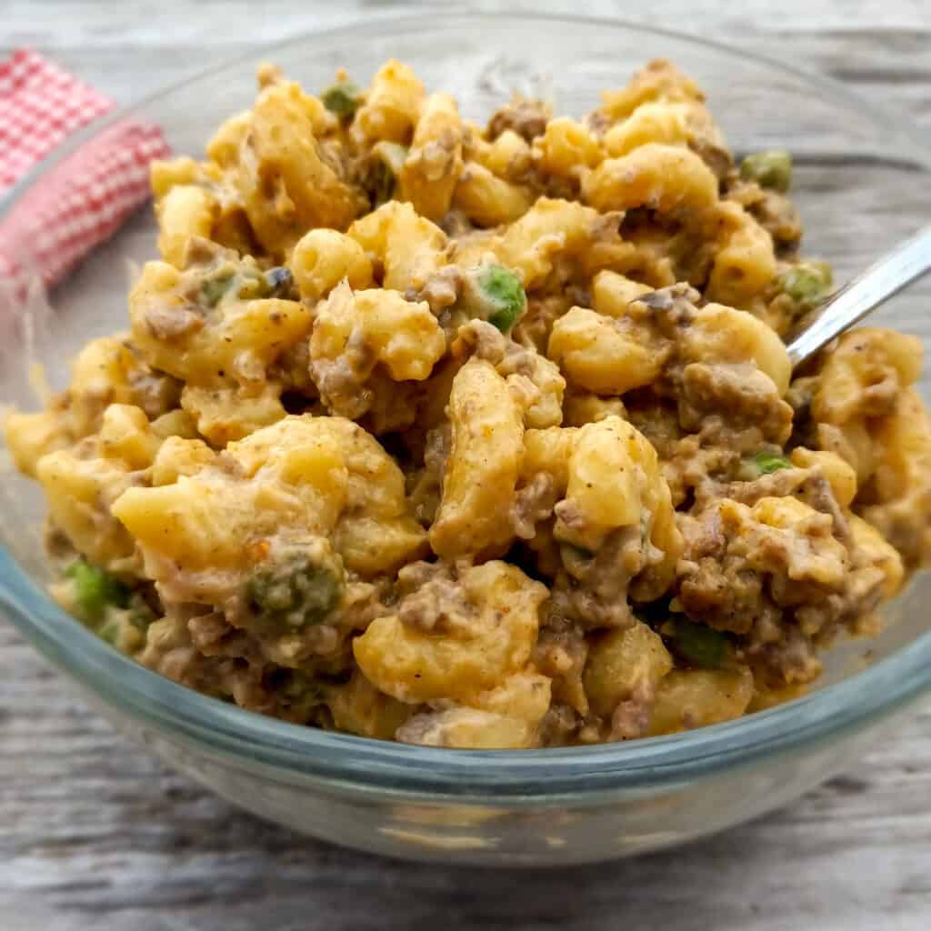 a bowl full of easy macaroni and meat casserole.