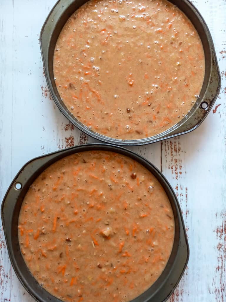 carrot cake batter in pans ready to bake.