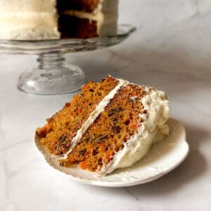 a slice of Amish carrot cake on a small plate.