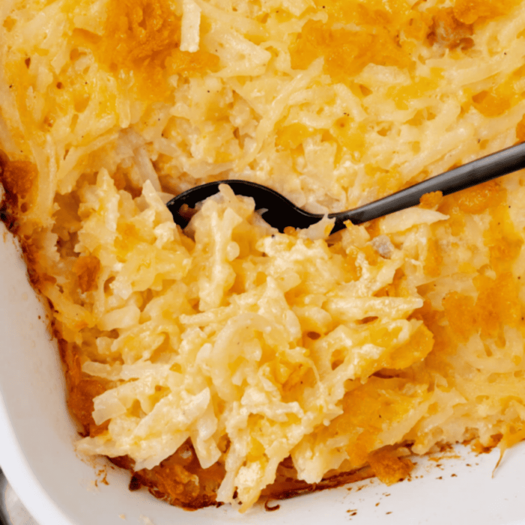 a dish of hash brown casserole.
