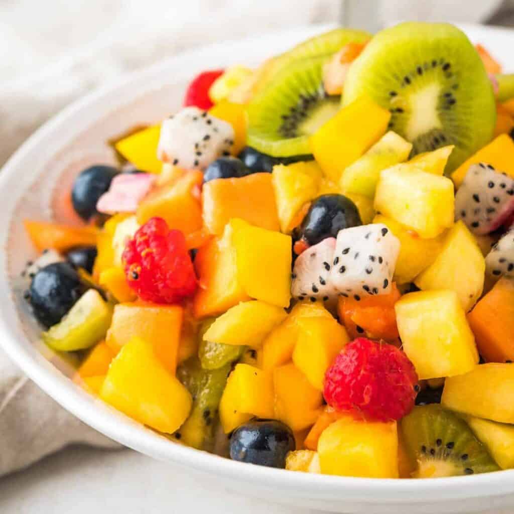 a bowl of tropical fruit salad.