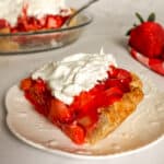 slice of fresh Amish strawberry pie with Cool Whip.