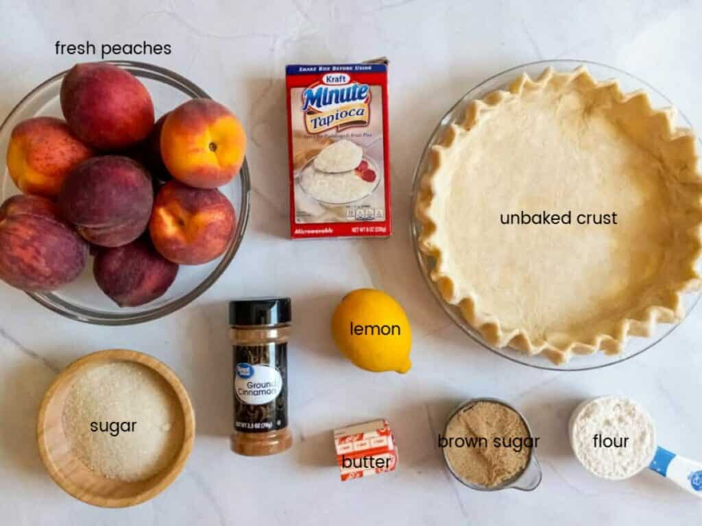 Ingredients: peaches, tapioca, sugar, lemon, flour, butter, brown sugar, and crust.