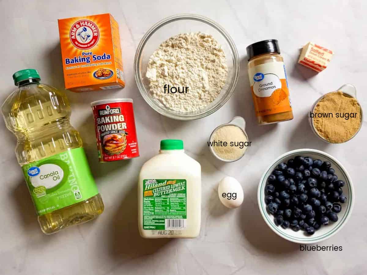 Ingredients: blueberries, buttermilk, flour, sugar, brown sugar, egg, butter, cinnamon, oil, baking powder, and baking soda.