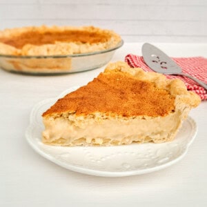 slice of Amish custard pie on a little plate.