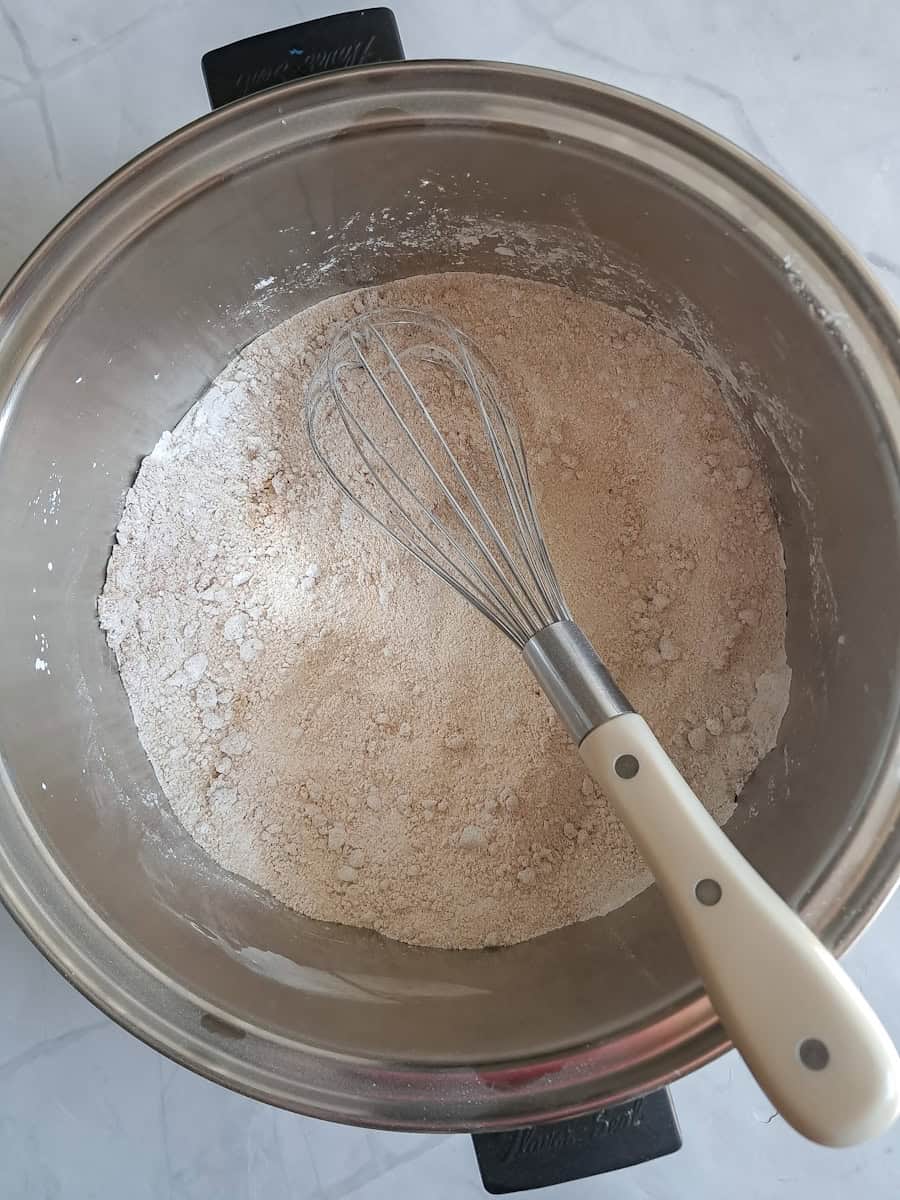 mixing the dry ingredients in a large cooking pot.