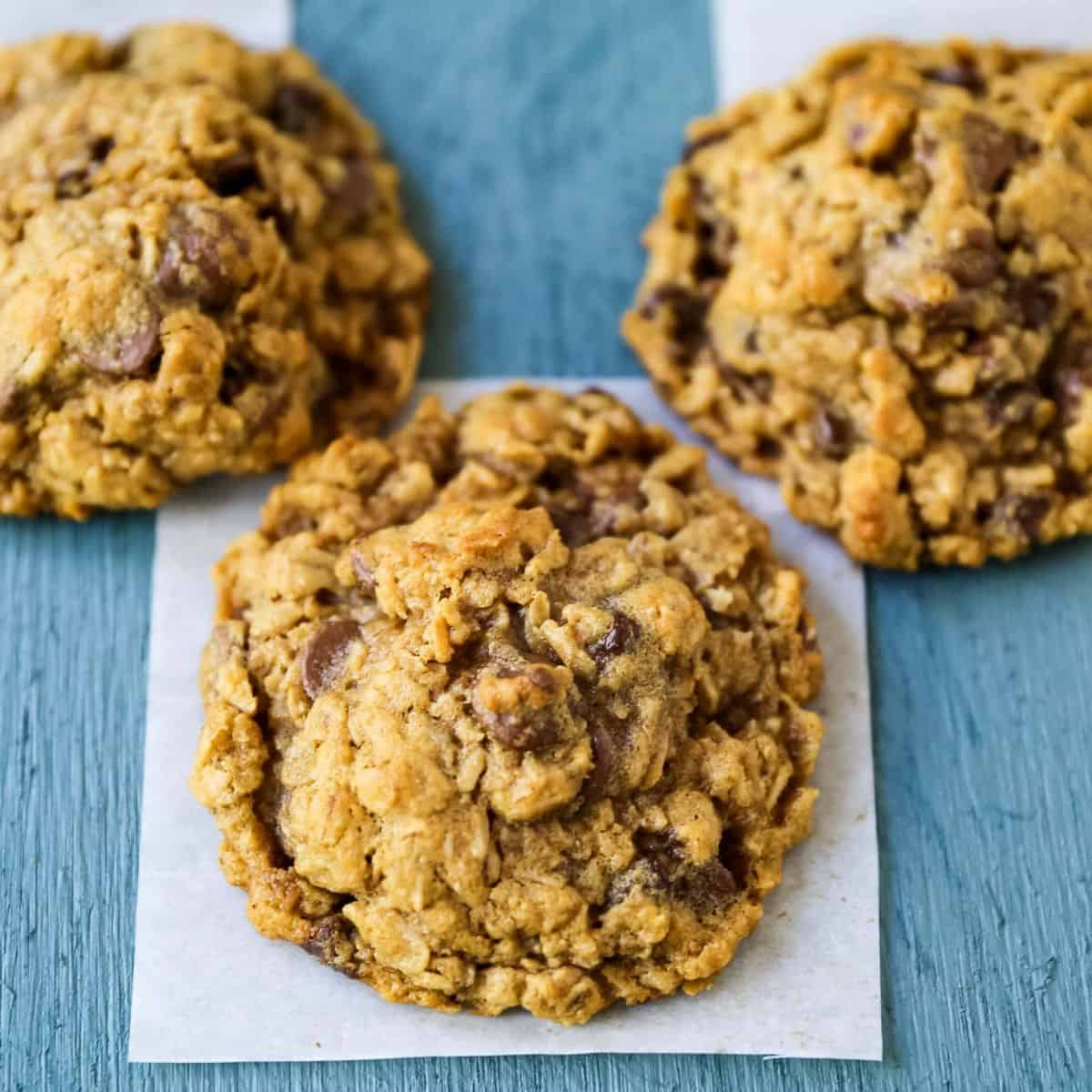 three chocolate chip peanut butter oatmeal cookies.