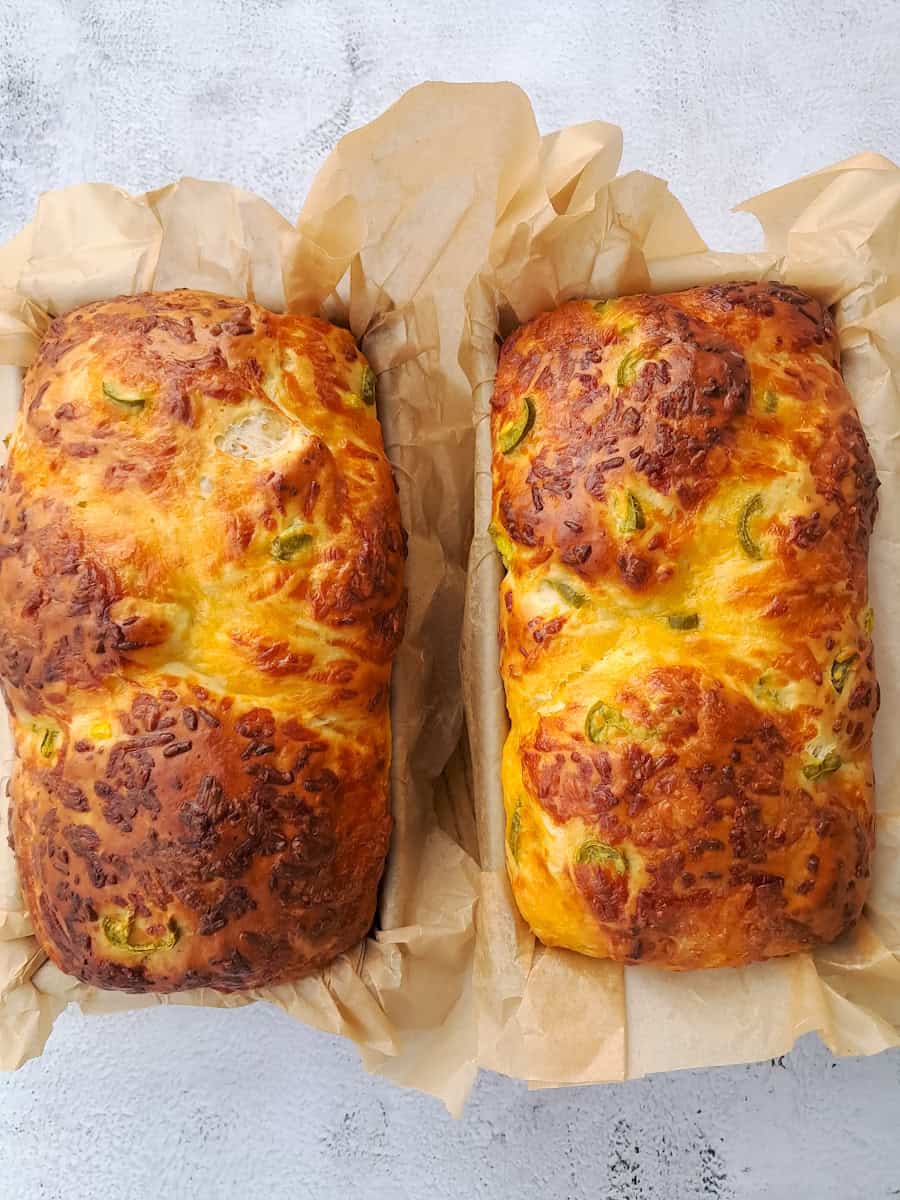 two loaves of freshly baked Amish cheese bread.