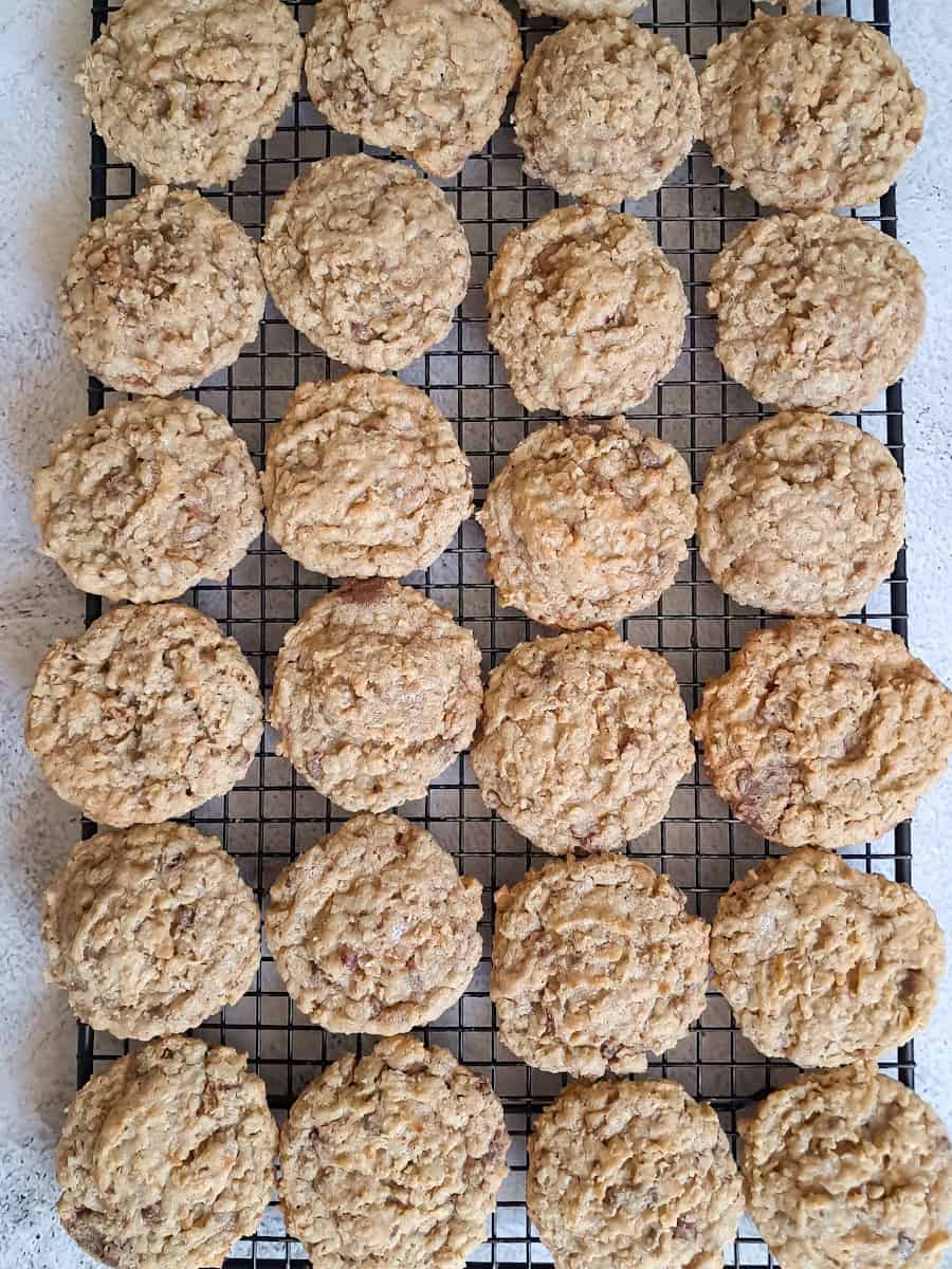 Amish toffee crunch cookies cooling on a wire rack.